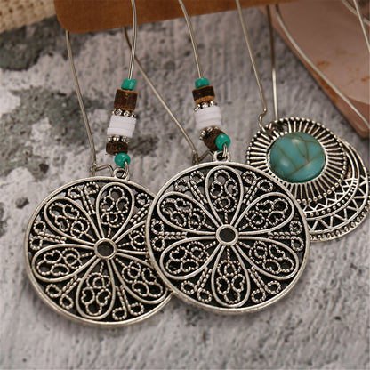 Conjunto de aretes y pulseras bohemias vintage de Boniskiss: pulsera bohemia con gancho y colgante